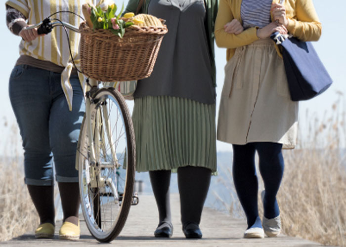 image of women wearing compression stockings on a walk